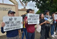 Students of West Visayas State University in La Paz, Iloilo City oppose the planned deployment of soldiers in schools. They warn of a creeping martial law in academic institutions. IAN PAUL CORDERO/PN