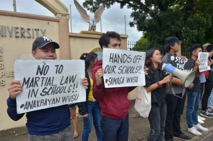 West Visayas State University Students of West Visayas State University in La Paz, Iloilo City oppose the planned deployment of soldiers in schools. They warn of a creeping martial law in academic institutions. IAN PAUL CORDERO/PN