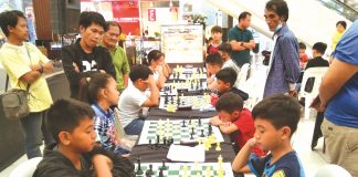 Escalante school rules Pavia inter- elementary chess Elementary chess players in action during the 2019 Inter-Elementary School Dalawahan Chess Competition at the GT Town Center in Pavia, Iloilo. PAVIA CHESSERS PHOTO