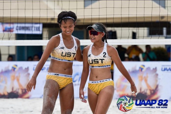 University of Santo Tomas Golden Tigresses’ Babylove Barbon and Gen Eslaplor. UAAP PHOTO