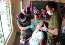 PH Army conducts medical, dental services in Calinog Volunteers of the 61st Infantry Battalion of the Philippine Army conduct free dental services to residents of Barangay Supanga in Calinog, Iloilo on Aug. 31. 61IB/PIA