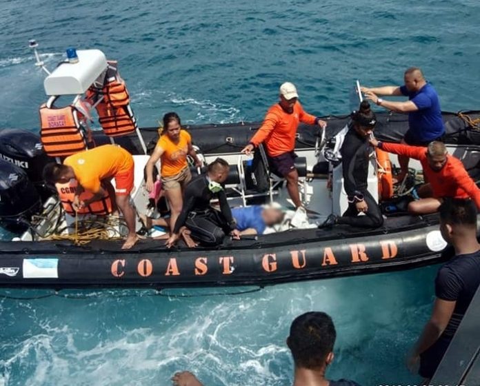 Dragon Boat Boracay BORACAY SEA TRAGEDY. Coastguards retrieve the body of a drowned dragon boat rower in Boracay Island on Sept. 25, 2019. The dragon boat paddlers were holding on to the boat. However, strong waves made the boat roll over, making it unstable and displacing the paddlers, according to the Public Information Unit of the municipality of Malay, Aklan which has jurisdiction over Boracay. PHILIPPINE COAST GUARD PHOTO