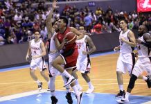 Barangay Ginebra San Miguel Kings’ Earl Scottie Thompson attacks the defense of Alaska Aces’ Simon Enciso for an inside hit. PBA PHOTO