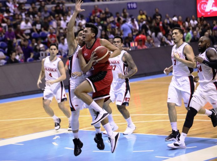 Earl Scottie Thompson Barangay Ginebra San Miguel Kings’ Earl Scottie Thompson attacks the defense of Alaska Aces’ Simon Enciso for an inside hit. PBA PHOTO