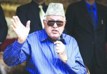 India arrests senior Kashmir leader under controversial law National Conference president Farooq Abdullah addresses his supporters during an election campaign rally in Srinagar, Indian controlled Kashmir. AP