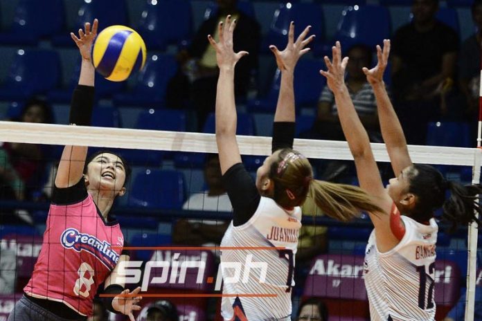 Fille Cainglet-Cayetano Bacolodnon Fille Cainglet-Cayetano scores against two Chef’s Classics Lady Red Spikers defenders. SPIN.PH PHOTO