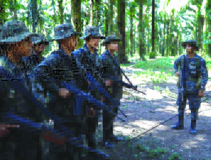 Soldiers stand in formation during a temporary state of siege, approved by the Guatemalan Congress following the death of several soldiers last week, in the community of Semuy II, Izabal province, Guatemala Sept. 9, 2019. REUTERS
