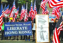HK protesters call on Trump to ‘liberate’ city Protesters hold signs and U.S. flags during a rally in Hong Kong, China on Sept. 8, 2019. REUTERS
