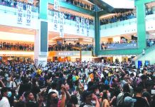 Anti-government protesters hold a rally in a shopping mall in Sha Tin, Hong Kong, China Sept. 22, 2019. REUTERS