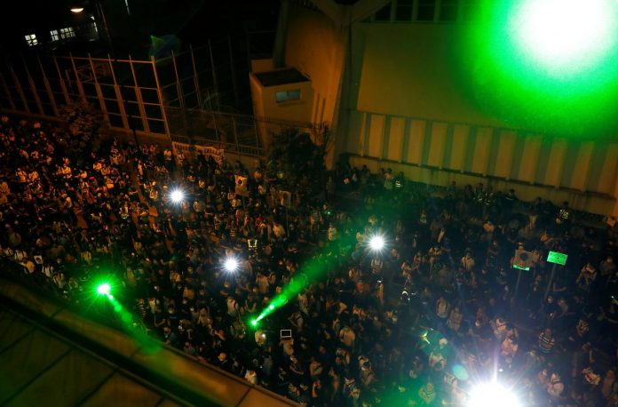 Hong Kong protesters block roads Anti-government protesters gather outside the venue of the first community dialogue where Chief Executive Carrie Lam spoke in Hong Kong, China on Sept. 26. REUTERS/TYRONE SIU