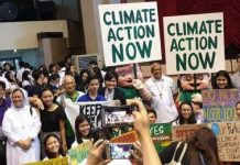 Resource persons and participants of the “House is on Fire: The Climate Change Emergency Forum” hold placards calling for climate protection at the University of St. La Salle Coliseum in Bacolod City on Tuesday. CARLOS HILADO MEMORIAL STATE COLLEGE FACEBOOK PAGE
