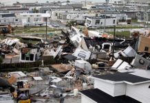 Mobile homes are upended and debris is strewn about at the Holiday Trav-l Park, Thursday, Sept. 5, 2019, in Emerald Isle, N.C, after a possible tornado generated by Hurricane Dorian struck the area. Photo by Julia Wall/The News & Observer