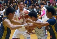 Players of Iloilo United Royals (blue) and Pasay Voyagers (white) grapple for the ball during their 2019-2020 Maharlika Pilipinas Basketball League Lakan Cup game last night at the University of San Agustin Gym. IAN PAUL CORDERO/PN