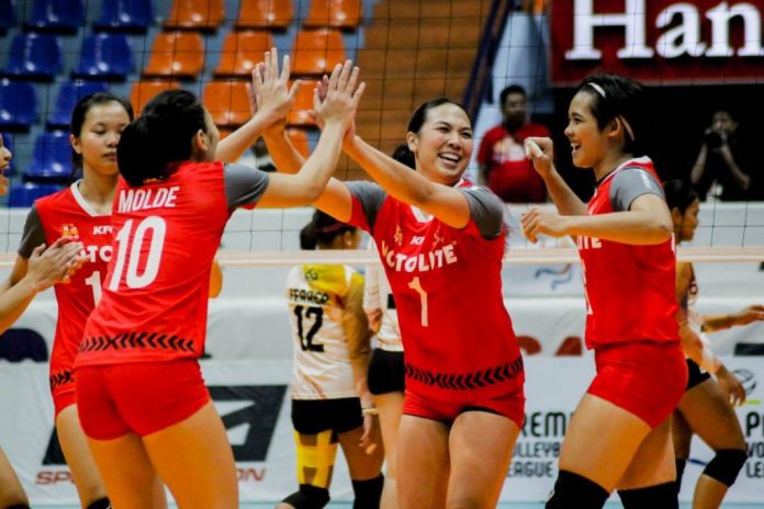 Iris Tolenada and Maria Lina Molde of Motolite Power Builders rejoice after completing their come-from-behind win against Choco Mucho Flying Titans. SPORTS VISION PHOTO