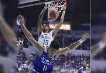 De La Salle University Green Archers’ Jamie Orme-Malonzo scored a two-handed dunk against the defense of Ateneo Blue Eagles’ Thirdy Ravena. SPIN.PH PHOTO