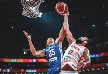 Japeth Aguilar of the Philippines blocks the shot attempt of Makram Ben Romdhane of Tunisia. FIBA PHOTO