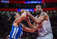 The Philippines’ Japeth Aguilar’s is hit with the ball on the face as he tries to steal it from Iran’s Hamed Haddadi. FIBA PHOTO