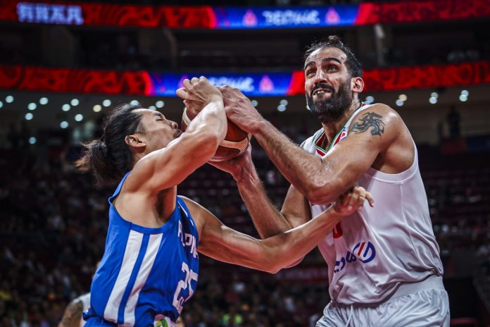 Japeth Aguilar The Philippines’ Japeth Aguilar’s is hit with the ball on the face as he tries to steal it from Iran’s Hamed Haddadi. FIBA PHOTO