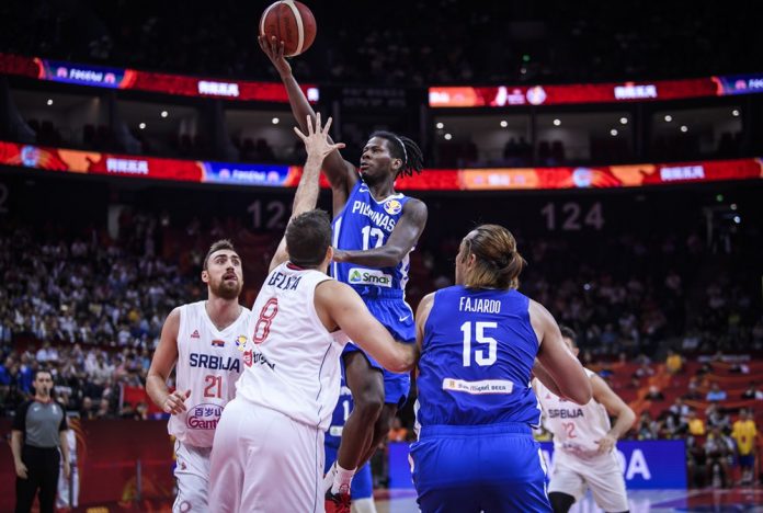 Jaymar Perez Philippines’ Jaymar Perez stretches for a layup against the defense of Serbia’s Nemanja Bjelica. FIBA PHOTO