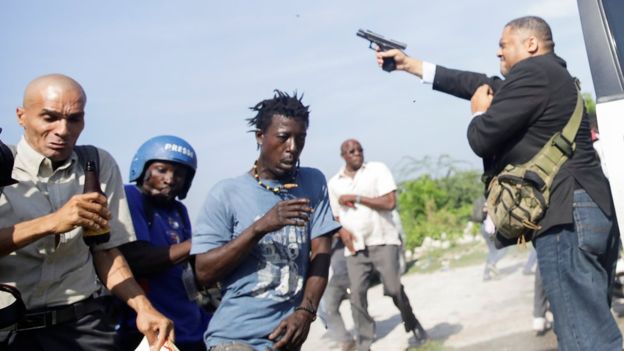 Jean Marie Ralph Féthière Sen. Jean Marie Ralph Féthière (right) opens fire as he left parliament in the capital Port-au-Prince on Monday, wounding two people. REUTERS