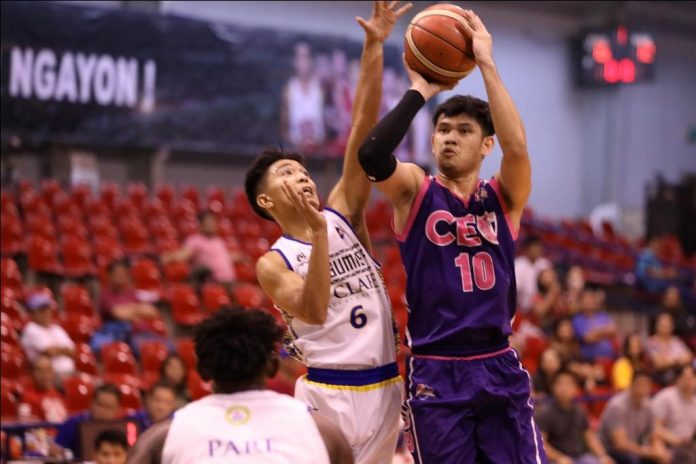 Joshua Fontanilla of BRT Sumisip Basilan-St. Clare Saints tries to stop the shot attempt of Centro Escolar University Scorpions’ Rich Guinitaran. PBA MEDIA GROUP PHOTO