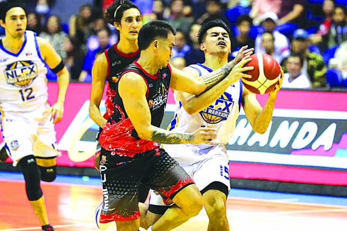 Kiefer Ravena Kiefer Ravena of NLEX Road Warriors is hacked by Phoenix Fuel Masters’ Ryan Roose Garcia. PBA PHOTO