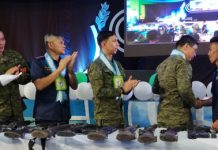 Military to dismantle 2 Negros rebel fronts Army officials applaud the surrender of a firearm of former communist rebel ‘Ka Joros’ to Brigadier General Eric Vinoya (second from right) during the North Negros Peace Summit in Escalante City on Friday. NANETTE L. GUADALQUIVER/PNA