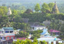 A landscape view of the downtown with ancient pagodas in the background in Mrauk U, Rakhine state, Myanmar June 28, 2019. REUTERS