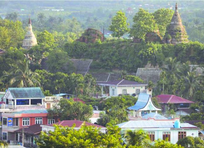 Myanmar A landscape view of the downtown with ancient pagodas in the background in Mrauk U, Rakhine state, Myanmar June 28, 2019. REUTERS