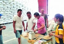 This warehouse of the National Food Authority in Barangay Bolo, Roxas City procures a total of 1,215 bags of clean and dry palay from two individual farmers and three farmer cooperatives last Sept. 13, 2019. NFA VIA PIA
