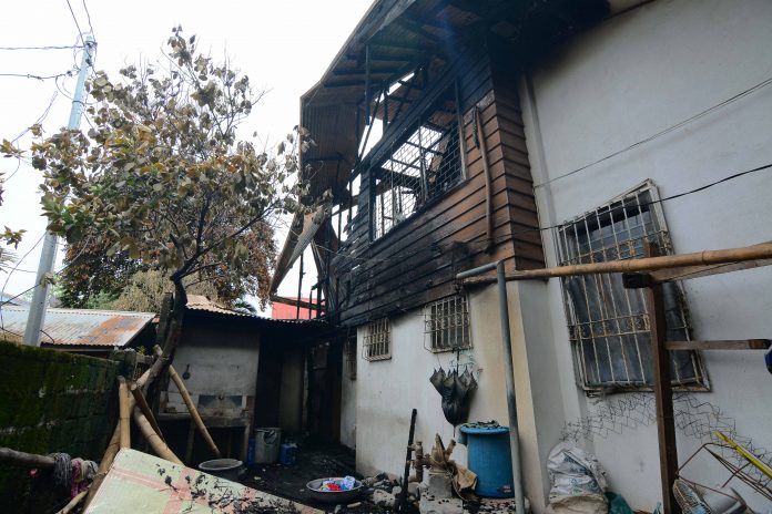 Resident Nicanor Suobiron, 72, died from suffocation after he was trapped inside his room at the height of the fire in Barangay Bagumbayan, Guimbal, Iloilo on Wednesday early morning, Sept. 4. IAN PAUL CORDERO/PN