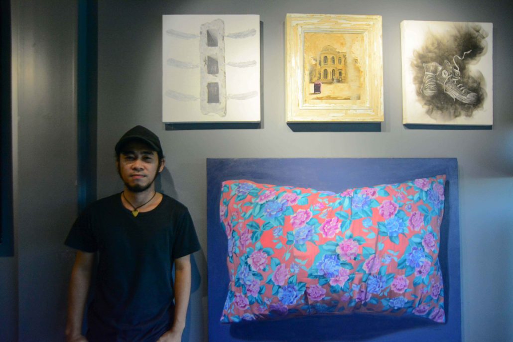 Ilonggo painter Jason Delgado exhibits his works “Early Attempts” (top left) and “Your Mind is a Garden” (bottom).