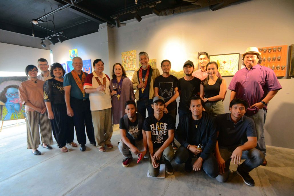 The Omriel Art Gallery’s founders are joined by the artists in the inaugural exhibit entitled “Blood Line.” (From left) Yuhum Muriel Dean, Christopher Dean, Dr. Omega Garibay, Ambassador Uriel Norman Garibay, Iloilo City Mayor Jerry Treñas, Rosalie Treñas, Manny Garibay, PJ Cabanalan, Jason Delgado, Kristoffer Brasileño, Jirah Labanza, Agos Payapa, (seated) Marvin Dalisay, Joebert Gayoma, Noel Elicana, and Bam Garibay.