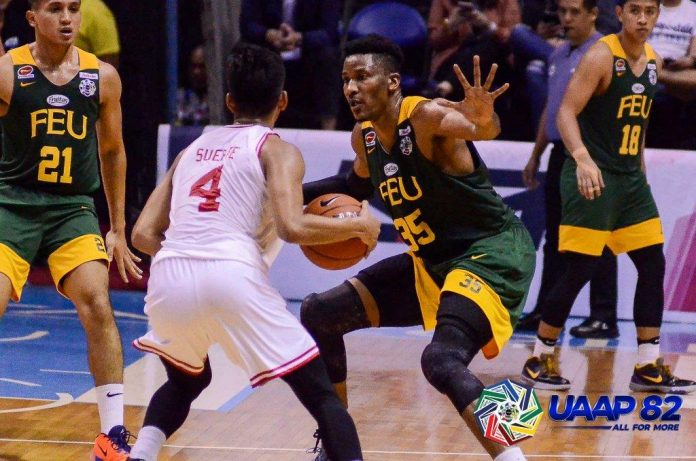 Pat Tcuente of Far Eastern University Tamaraws defends University of the East Red Warriors; Rey Suerte. UAAP PHOTO