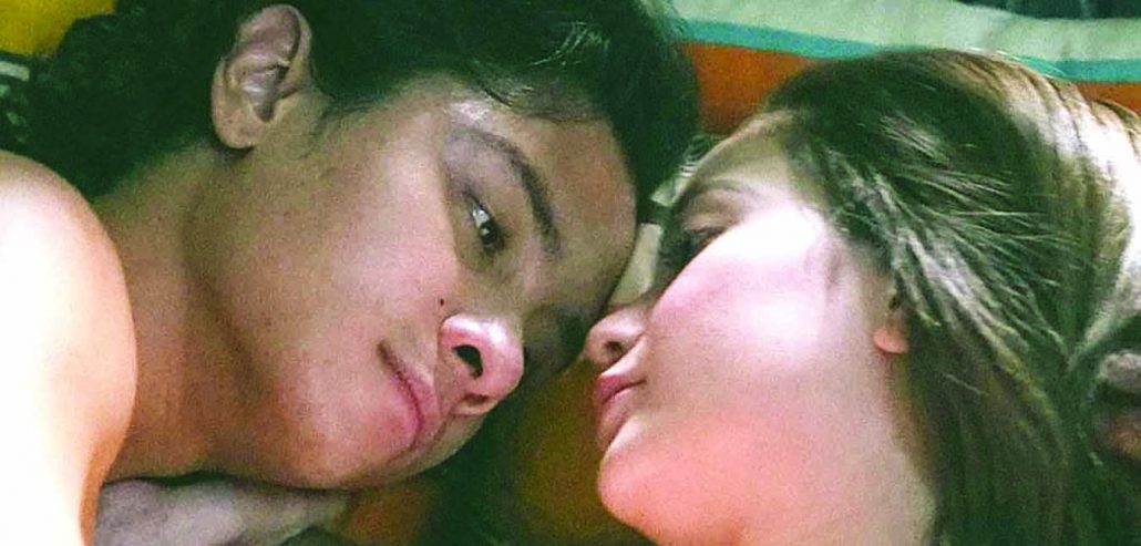 JC Santos and Arci Munoz tender in modern romance “Open.”