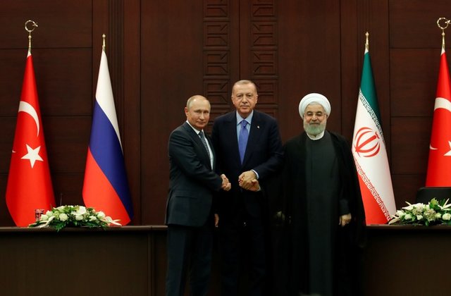 Presidents Vladimir Putin of Russia, Tayyip Erdogan of Turkey and Hassan Rouhani of Iran (From left) Presidents Vladimir Putin of Russia, Tayyip Erdogan of Turkey and Hassan Rouhani of Iran pose following a joint news conference in Ankara, Turkey, Sept. 16, 2019. REUTERS