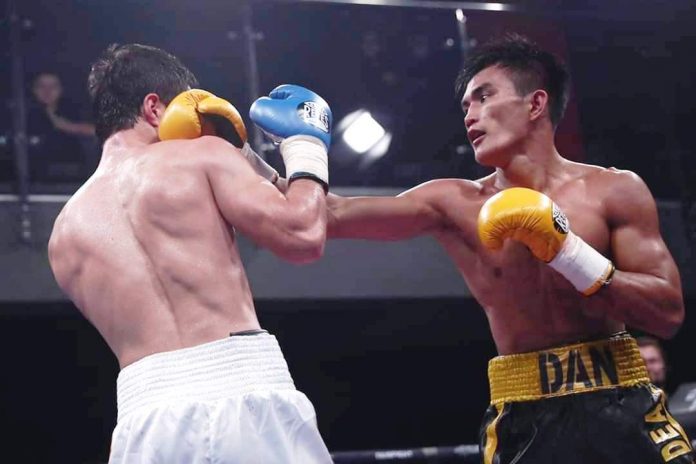 Roldan Aldea Negrense boxer Roldan Aldea connects a left straight to the face of Ravshanbek Umurzakov. RCC BOXING PROMOTIONS PHOTO