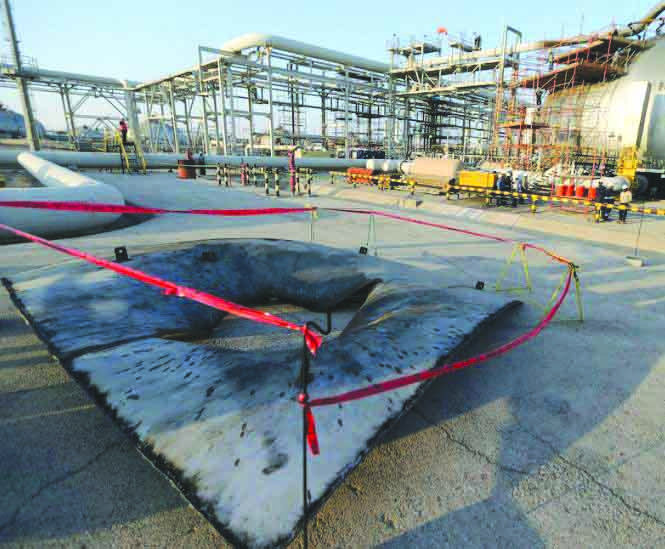 Saudi Aramco oil facility A metal part of a damaged tank is seen at the damaged site of Saudi Aramco oil facility in Abqaiq, Saudi Arabia, Sept. 20, 2019. REUTERS