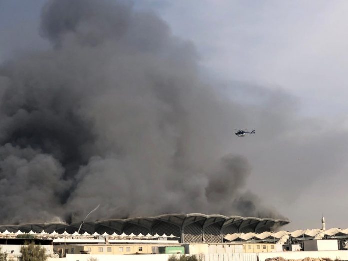 Saudi train station fire A firefighting helicopter sprays water on a fire at the Haramain high-speed rail station in Jeddah, Saudi Arabia on Sept. 29. REUTERS/ISMAIL NOFAL