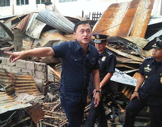 Sen. Christopher Lawrence “Bong” Go visits the victims of the Kalibo public market fire on Thursday. RANDY NACUSPAG