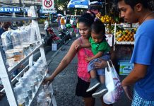 SIDEWALK VENDORS MUST GO – TREÑAS Passersby checkout tropical fishes being sold on the sidewalk of Ledesma Street, Iloilo City. Nearby is a sidewalk fruit stand. These and other sidewalk vendors would be removed, according to Mayor Jerry Treñas. IAN PAUL CORDERO/PN