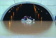 Flood kills 5 in southeast Spain Responders on a boat rescue a person stranded inside a flooded tunnel in Pilar dela Horadada, Spain on Sept., 2019. REUTERS