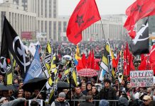 People attend a rally to demand the release of jailed protesters, who were detained during opposition demonstrations for fair elections in Moscow, Russia on Sept. 29. REUTERS/SHAMIL ZHUMATOV