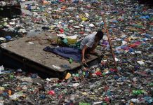 DENR urges public to stop throwing trash in waterways A scavenger uses a make-shift raft to collect reusable plastic from a river of trash and other debris in Binondo, Manila on Wednesday, April 22, a day after a thunderstorm brought heavy rains in Metro Manila. GMA NEWS