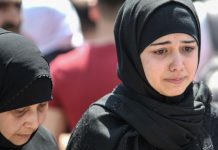 Turkey warns it may reopen the route for Syrian refugees to enter Europe if it does not get more international support for creating a safe zone in northern Syria. AFP