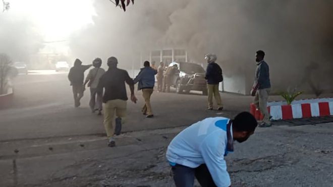 Hundreds of protesters, mostly high school students, set several buildings on fire in Wamena, Indonesia on Monday, killing at least 21 people. GETTY IMAGES