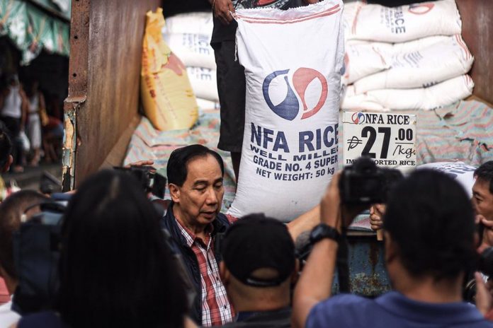William Dar Acting Department of Agriculture secretary William Dar visits Commonwealth Market in Quezon City to inspect the price of rice. ABS-CBN NEWS