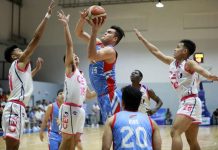 William McAloney of Marinerong Pilipino Skippers attacks the Centro Escolar University Scorpions defenders. PBA PHOTO