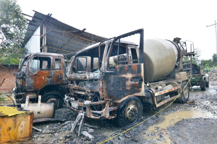 cement mixers Fire Guimbal, Iloilo These cement mixers of a construction company were torched by suspected rebels in Guimbal, Iloilo late night on Wednesday, Sept. 11, 2019. Police investigators believed the company resisted the rebels’ extortion attempts. IAN PAUL CORDERO/PN