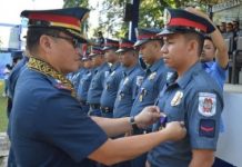 15 NegOcc cops get medals for arrest of 8 ‘rebels’ Brigadier General Rene Pamuspusan, director of Police Regional Office 6, pins the Medal of Merit on one of the policemen who implemented successful border control and checkpoint operations in Escalante City, Negros Occidental last month. The “Pagkilala” awarding ceremony was held in Bacolod City on Monday. NEGROS OCCIDENTAL POLICE PROVINCIAL OFFICE